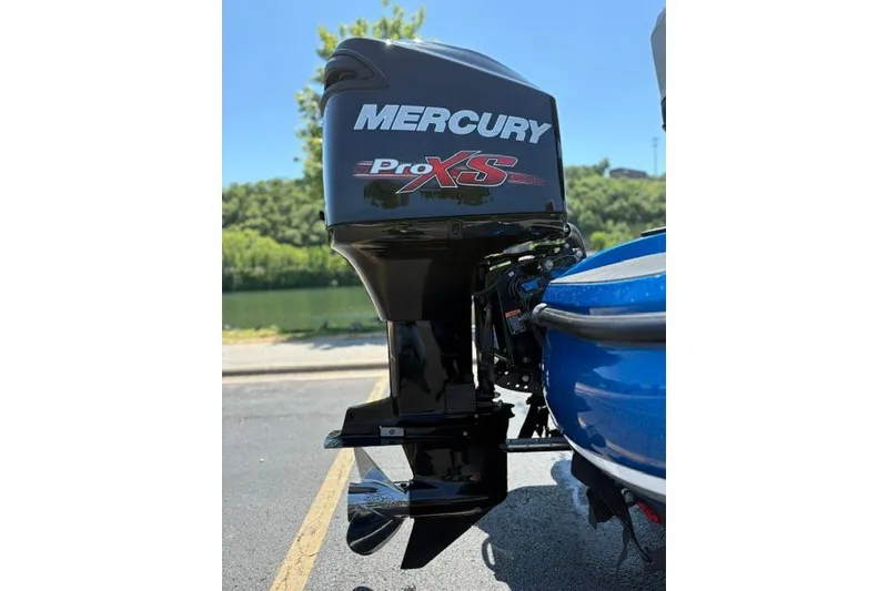 Slide: The Image of Mercury Pro XS outboard motor on a 2018 Nitro Z18 boat by the water. - 23