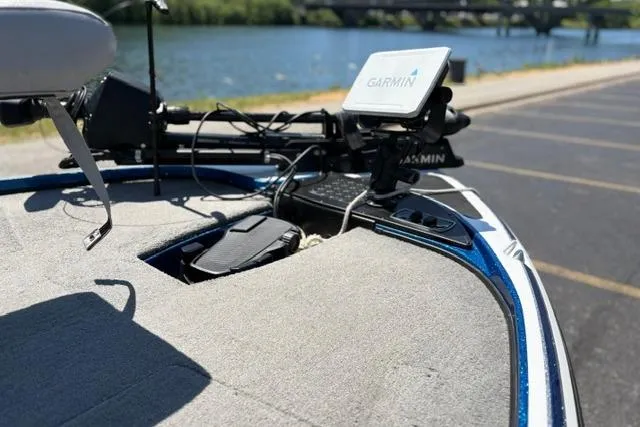 Slide: The Image of Nitro Z18 boat with Garmin navigation system, docked by a scenic lake, 2018 model. - 28