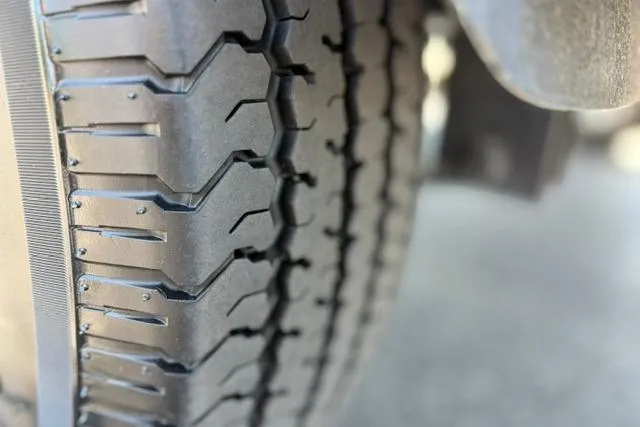 Slide: The Image of Close-up of a 2018 Nitro Z18 tire tread pattern. - 34