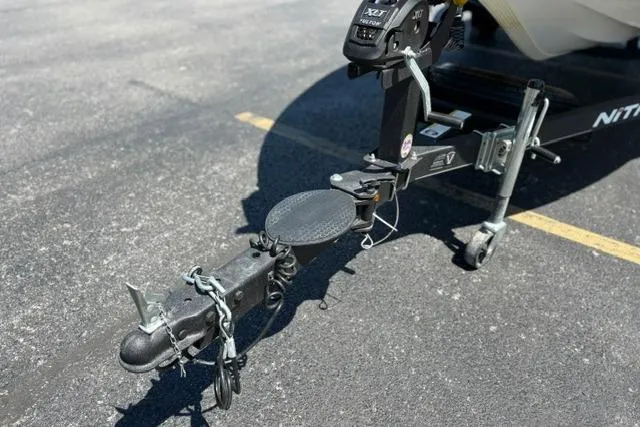 Slide: The Image of Trailer hitch of a 2018 Nitro Z18 boat on asphalt parking lot. - 35