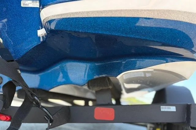 Slide: The Image of Close-up of a blue 2018 Nitro Z18 boat hull on a trailer. - 38