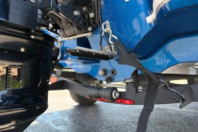 Slide: The Image of Close-up of a 2018 Nitro Z18 boat trailer hitch and motor components. - 39