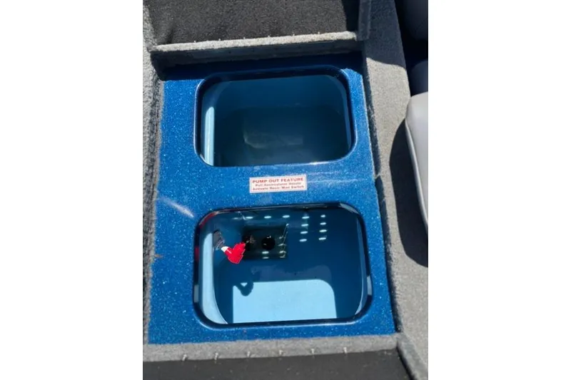 Slide: The Image of Livewell compartments in a 2018 Nitro Z18 boat, featuring pump-out feature. - 45