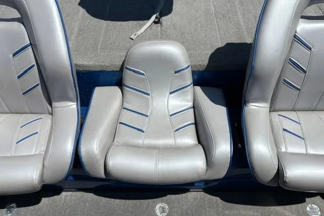 Slide: The Image of Silver seats in a 2018 Nitro Z18 boat, featuring blue accents and a central design. - 48
