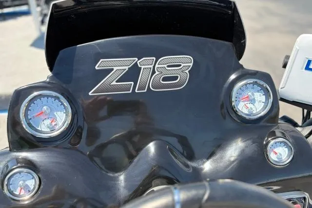 Slide: The Image of Dashboard of a 2018 Nitro Z18 boat with gauges and logo. - 53