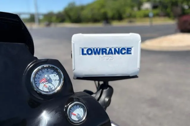 Slide: The Image of Dashboard of a 2018 Nitro Z18 with Lowrance HDS display and gauges. - 54