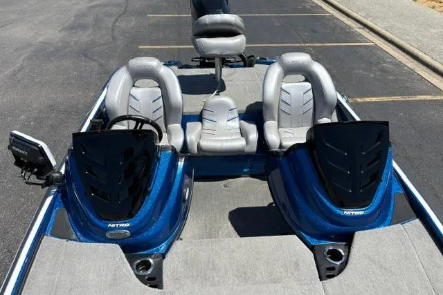 Slide: The Image of 2018 Nitro Z18 boat interior with dual seats and steering console. - 61