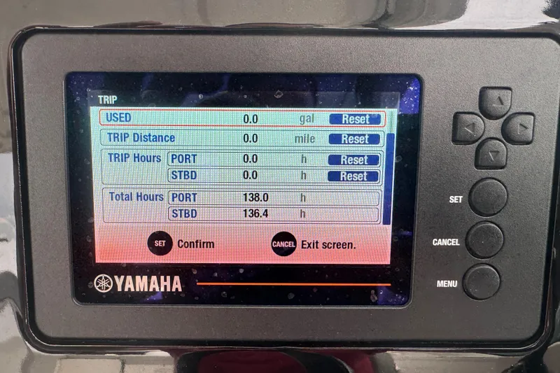 Slide: The Image of Yamaha boat display showing trip and total hours for Pursuit DC 266 Dual Console, 2022 model. - 16
