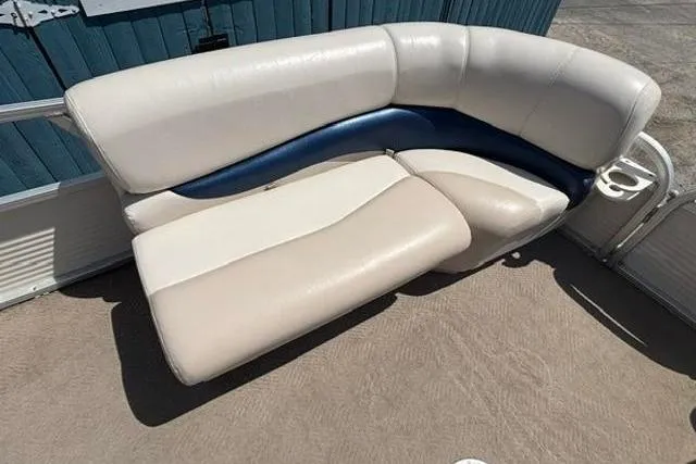 Slide: The Image of 2008 Sun Tracker Party Barge 18 DLX pontoon boat seating, beige and blue upholstery. - 10
