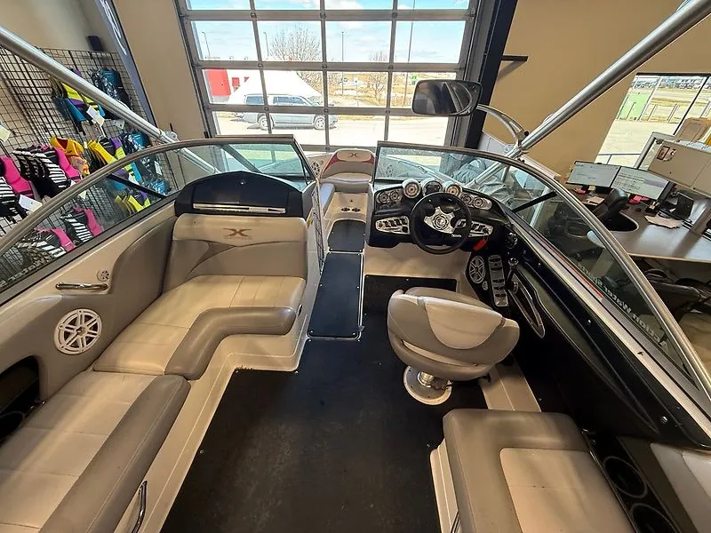 Slide: The Image of Interior of a 2008 MasterCraft X-15 boat with steering console. - 10