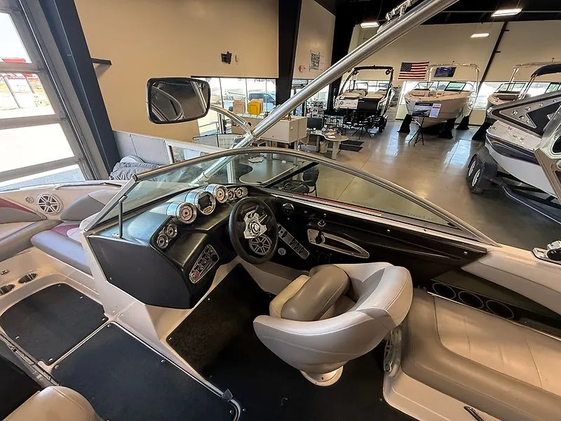 Slide: The Image of Interior of a 2008 MasterCraft X-15 boat in showroom. - 11