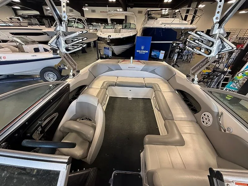 Slide: The Image of Interior of a 2008 MasterCraft X-15 boat in showroom. - 14