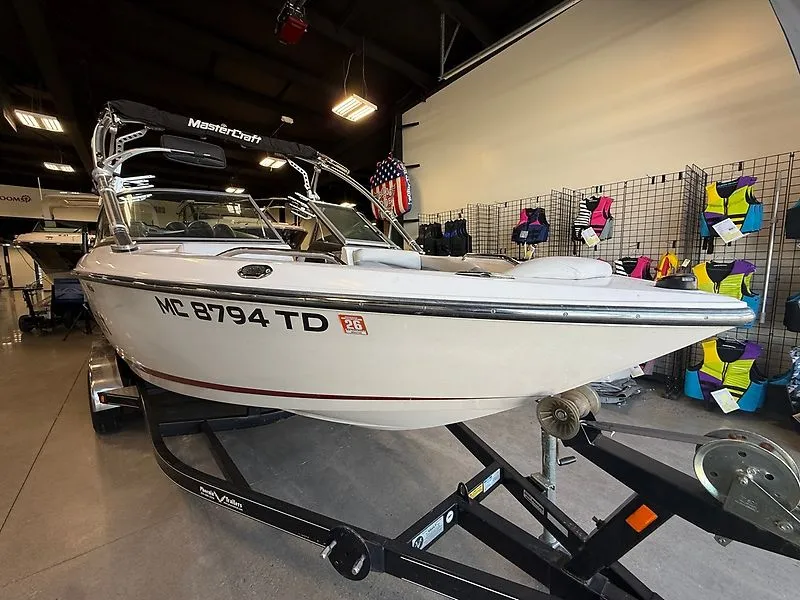 Slide: The Image of 2008 MasterCraft X-15 boat in showroom with accessories. - 3
