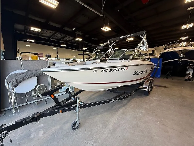 Slide: The Image of 2008 MasterCraft X-15 boat on trailer in warehouse. - 4