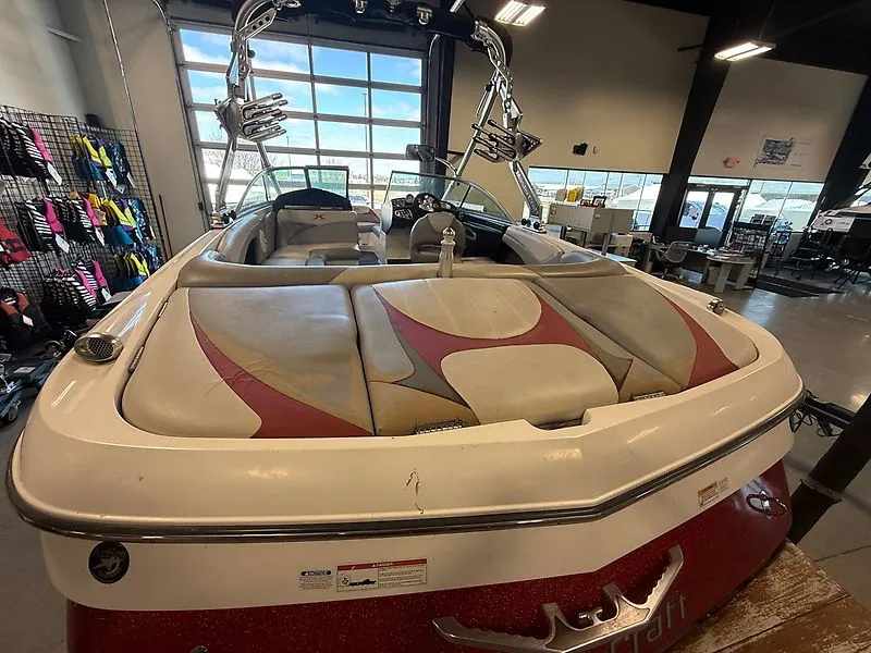 Slide: The Image of 2008 MasterCraft X-15 boat in showroom with interior view. - 6