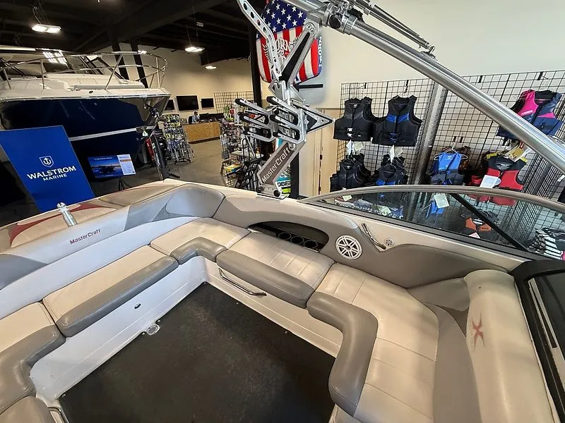 Slide: The Image of Interior view of a 2008 MasterCraft X-15 boat in showroom. - 9