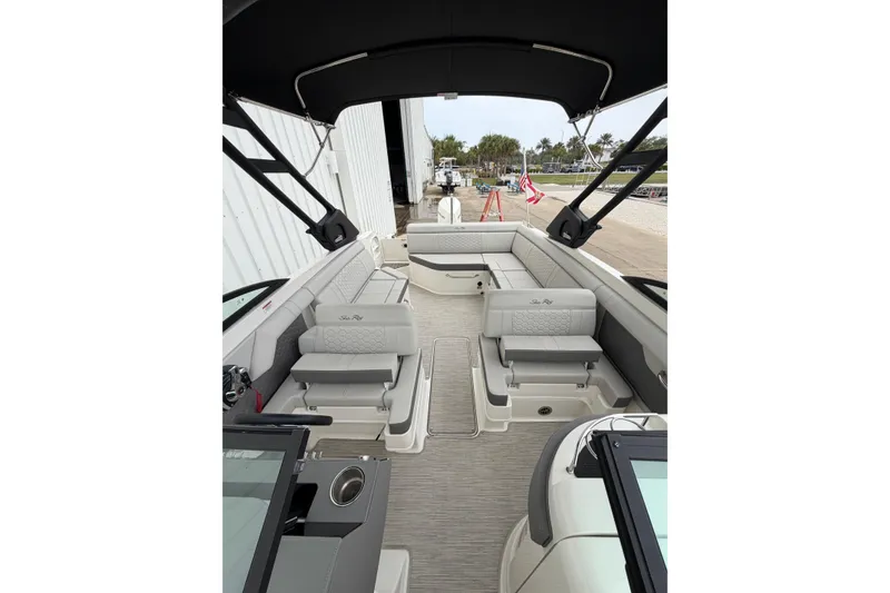 Slide: The Image of 2024 Sea Ray SDX 270 Outboard boat interior with spacious seating and modern design. - 10