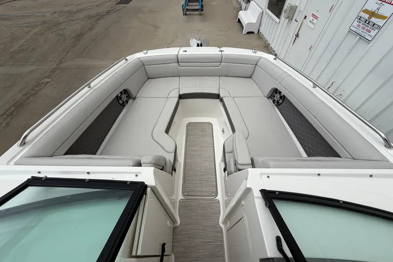 Slide: The Image of 2024 Sea Ray SDX 270 Outboard boat interior with spacious seating and modern design. - 11