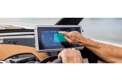 Slide: The Image of 2026 Yamaha Boats 222SE dashboard with touchscreen navigation system in use. - 4