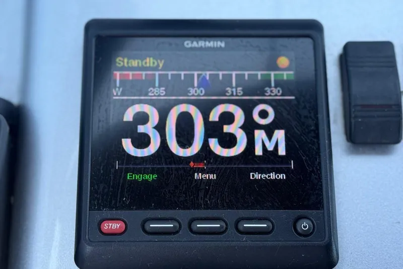 Slide: The Image of Garmin navigation display showing 303 meters on CNM Continental 2015. - 10