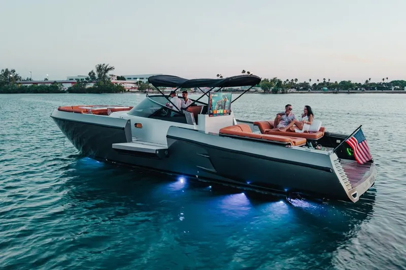 Slide: The Image of Luxurious 2015 CNM Continental yacht cruising on serene waters at sunset. - 30