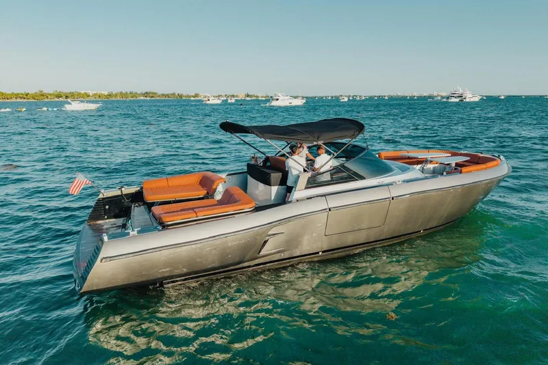 Slide: The Image of Luxurious 2015 CNM Continental yacht cruising on clear blue waters. - 35