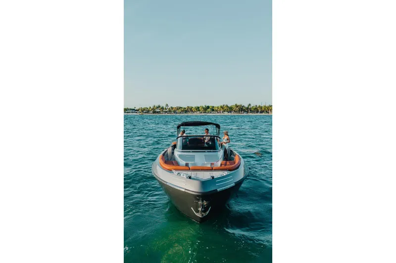 Slide: The Image of Luxury CNM Continental 2015 yacht cruising on clear blue waters. - 38