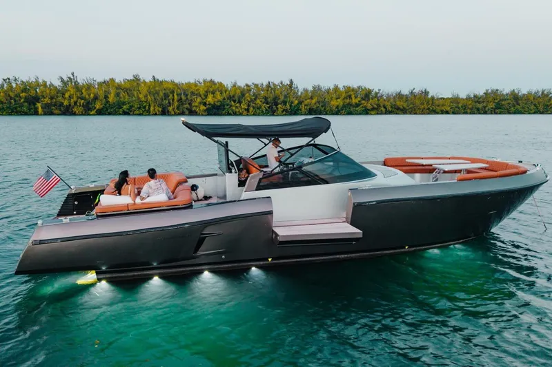 Slide: The Image of Luxurious 2015 CNM Continental yacht cruising on serene waters with passengers relaxing onboard. - 42