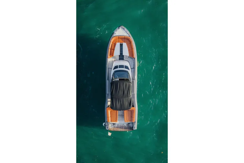 Slide: The Image of Aerial view of 2015 CNM Continental yacht on turquoise water. - 49