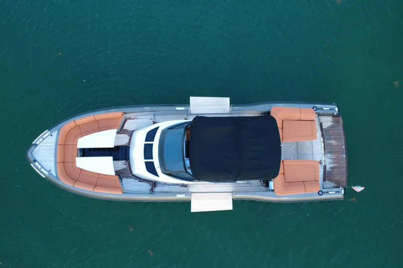 Slide: The Image of Aerial view of 2015 CNM Continental luxury boat on calm water. - 5