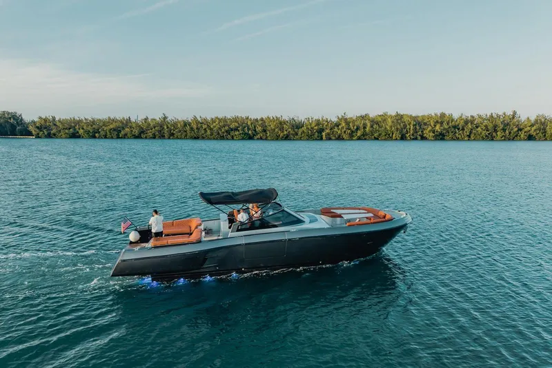 Slide: The Image of Luxurious 2015 CNM Continental yacht cruising on serene blue waters. - 56