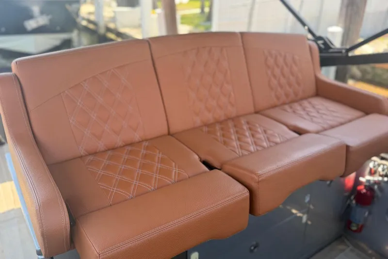 Slide: The Image of Luxurious brown leather seating with diamond stitching in a 2015 CNM Continental. - 6