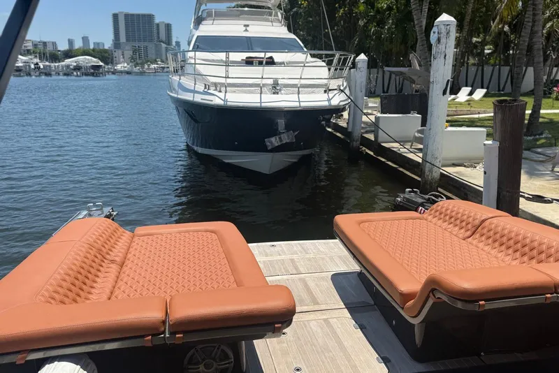 Slide: The Image of Luxurious yacht docked near waterfront with plush seating, CNM Continental 2015 model. - 7