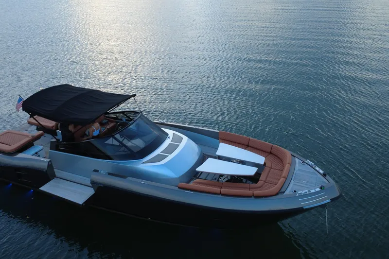 Slide: The Image of Luxurious 2015 CNM Continental yacht with sleek design, cruising on calm waters. - 8