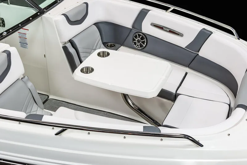 Slide: The Image of Manufacturer Provided Image: 2021 Chaparral 307 SSX boat interior with seating and table. - 10