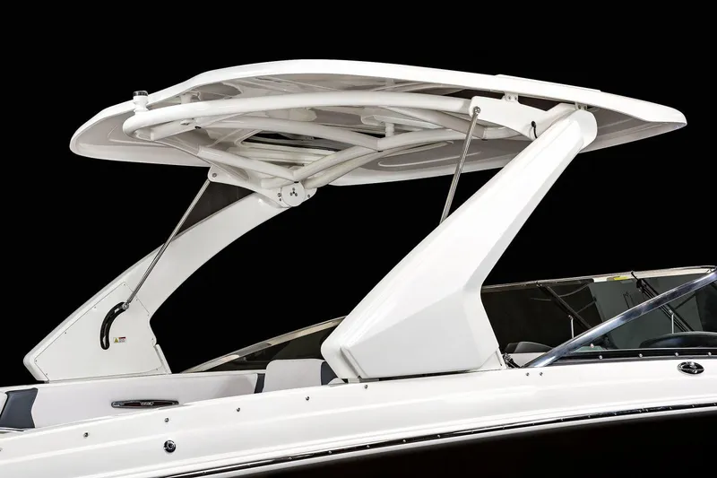 Slide: The Image of Manufacturer Provided Image: 2021 Chaparral 307 SSX boat with sleek white hardtop. - 20