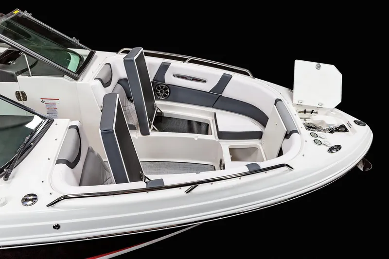 Slide: The Image of Manufacturer Provided Image: 2021 Chaparral 307 SSX boat interior with seating and storage compartments. - 8