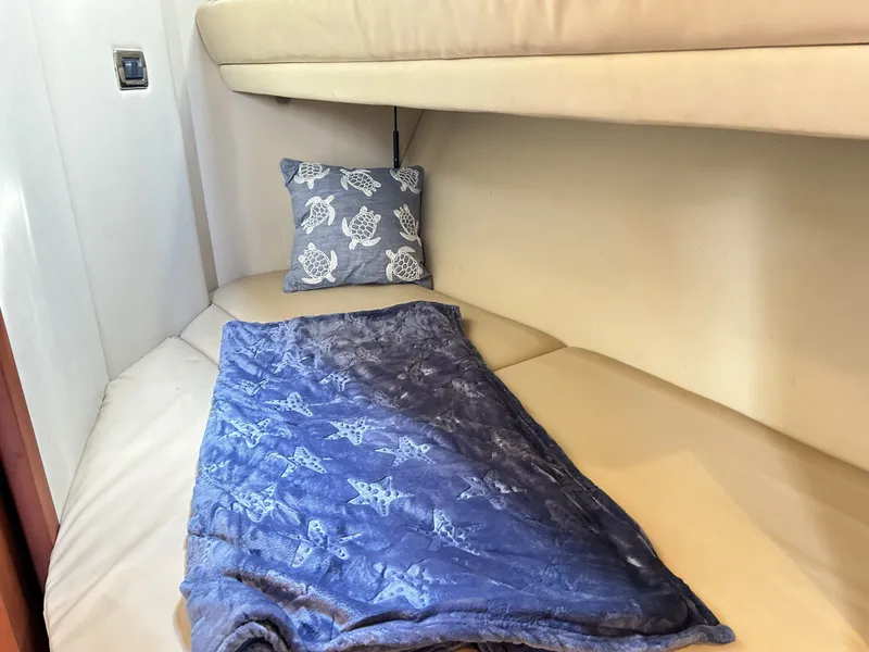 Slide: The Image of Interior of 2003 Sea Ray 410 Express Cruiser with cozy bed. - 32