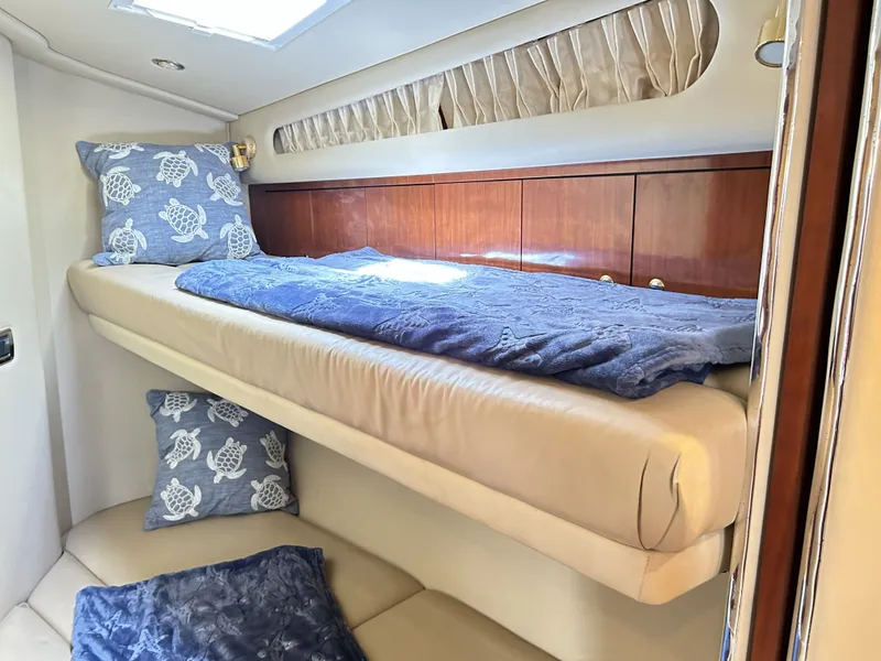 Slide: The Image of Interior of 2003 Sea Ray 410 Express Cruiser with bunk bed. - 33