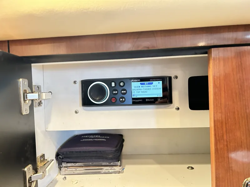 Slide: The Image of Fusion stereo in 2003 Sea Ray 410 Express Cruiser. - 40