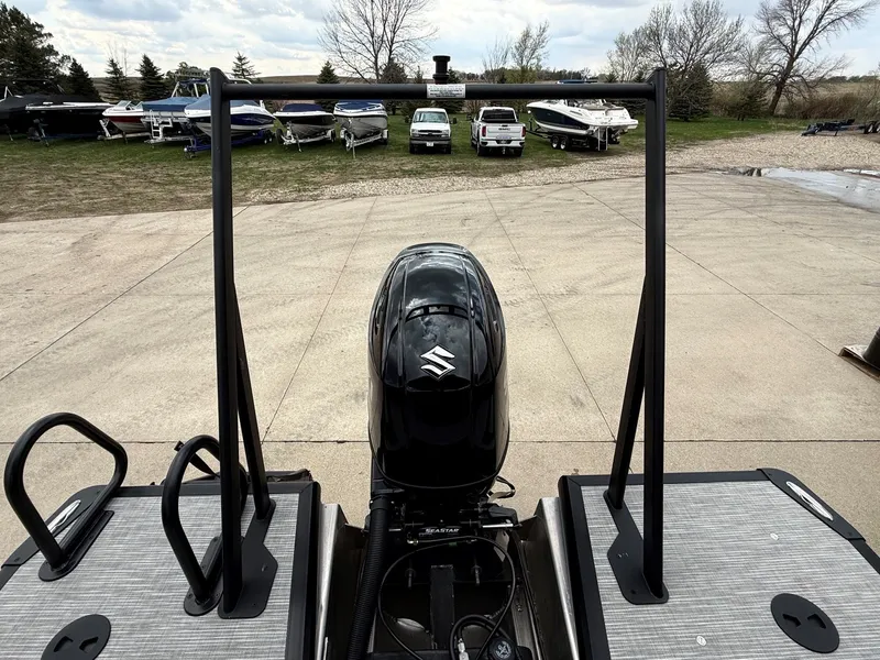 Slide: The Image of Viaggio Lago V 20C 2026 with Suzuki outboard motor, boats in background. - 27
