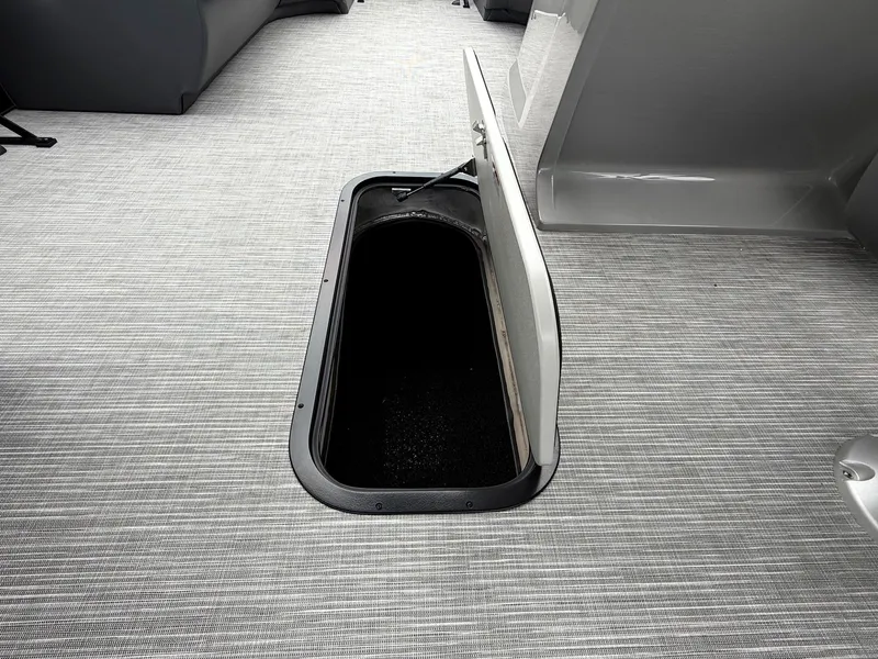 Slide: The Image of Viaggio Lago V 20C 2026 boat with open storage compartment lid. - 28