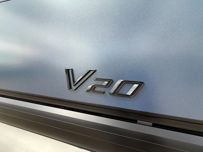 Slide: The Image of Viaggio Lago V 20C 2026 emblem on silver background. - 3