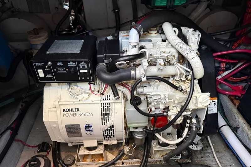 Slide: The Image of Engine room of 1998 Silverton 372 Motor Yacht with Kohler power system. - 22