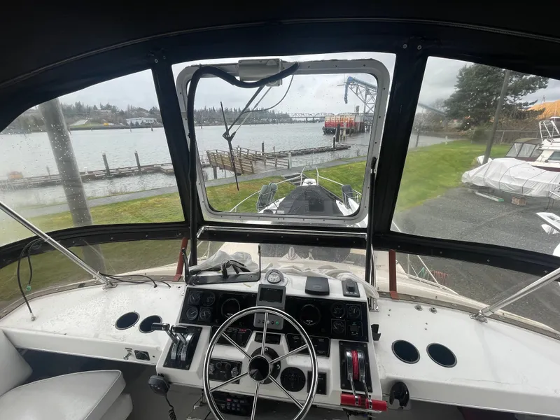 Slide: The Image of Interior view of 1992 Bayliner 38 Motoryacht at dock. - 13