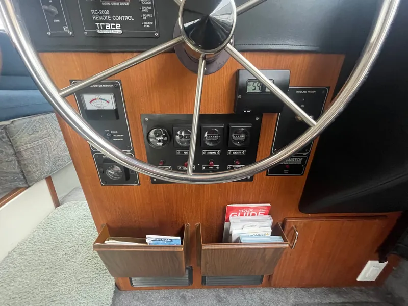 Slide: The Image of 1992 Bayliner 38 Motoryacht helm with control instruments. - 21