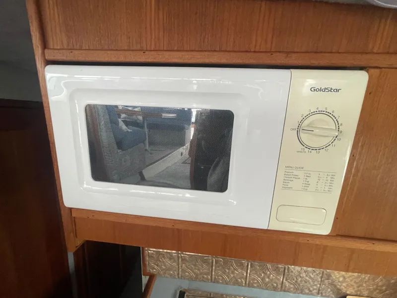 Slide: The Image of GoldStar microwave in 1992 Bayliner 38 Motoryacht. - 27
