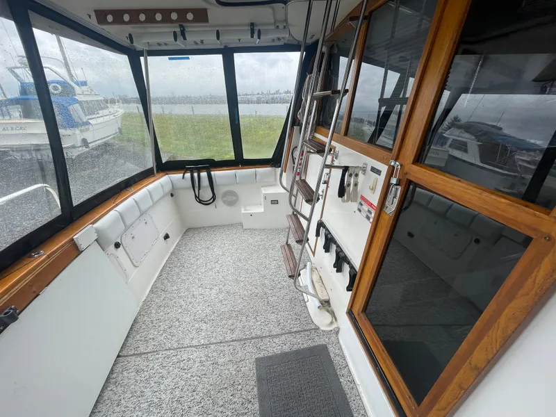 Slide: The Image of Interior of a 1992 Bayliner 38 Motoryacht with windows and stairs. - 3
