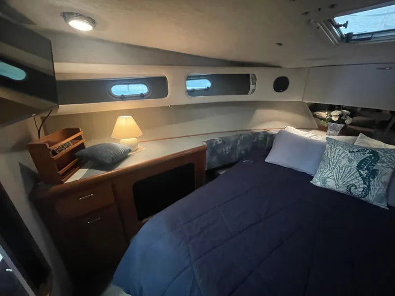 Slide: The Image of Interior of 1992 Bayliner 38 Motoryacht with cozy bedroom. - 37
