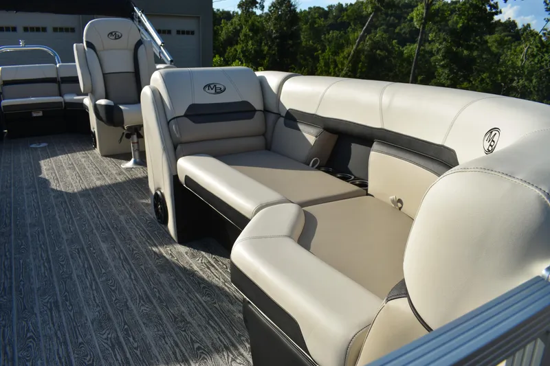 Slide: The Image of Luxurious seating on 2026 Montego Bay 8522 BR DLX pontoon boat, featuring elegant design. - 10